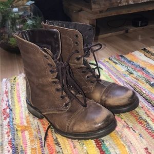 Brown leather combat boots